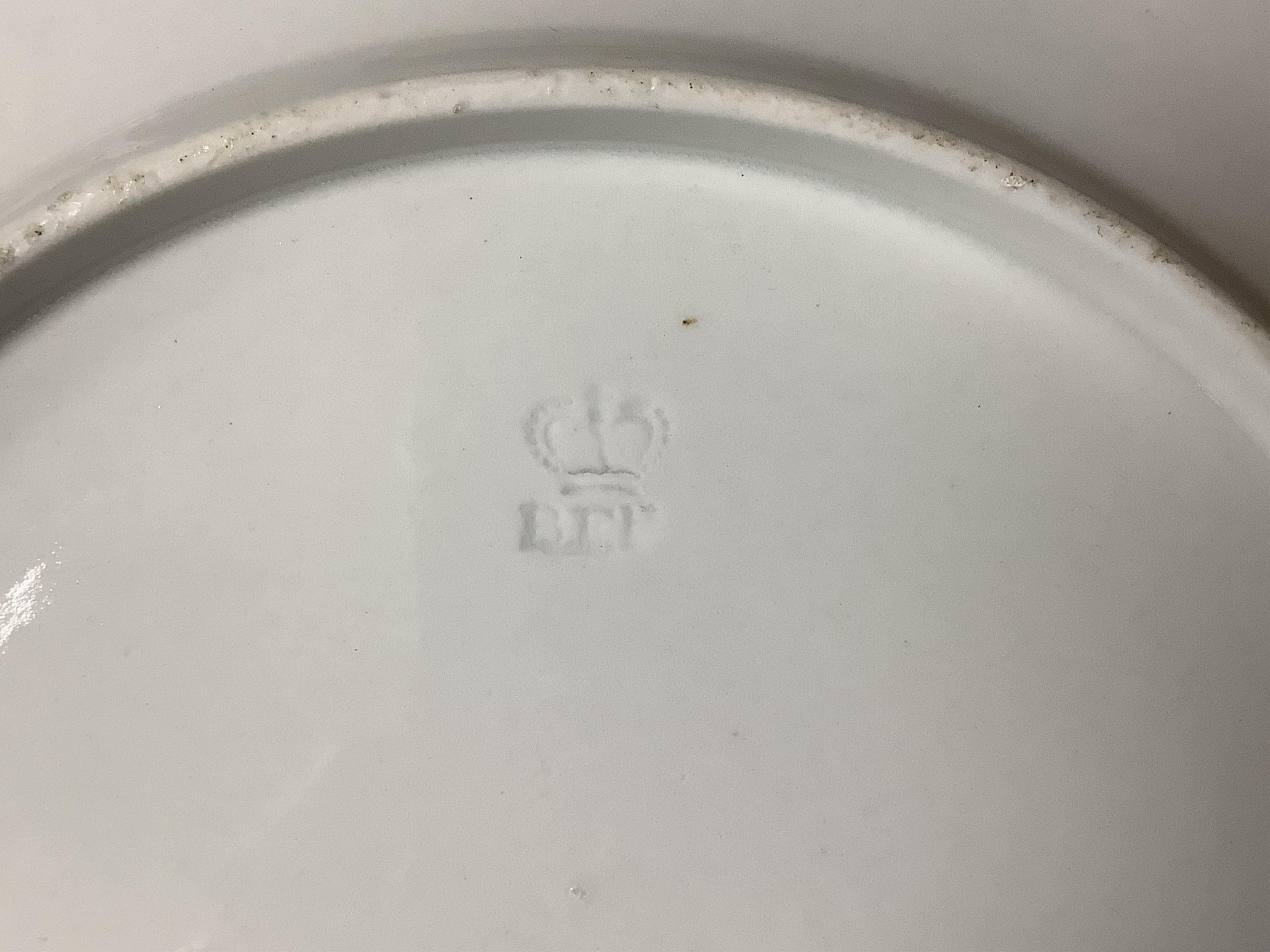 A collection of early 19th century English porcelain tea, dessert and dinner wares including Derby dessert plates, Bloor Derby, Barr Flight & Barr plate, Spode, Coalport etc.